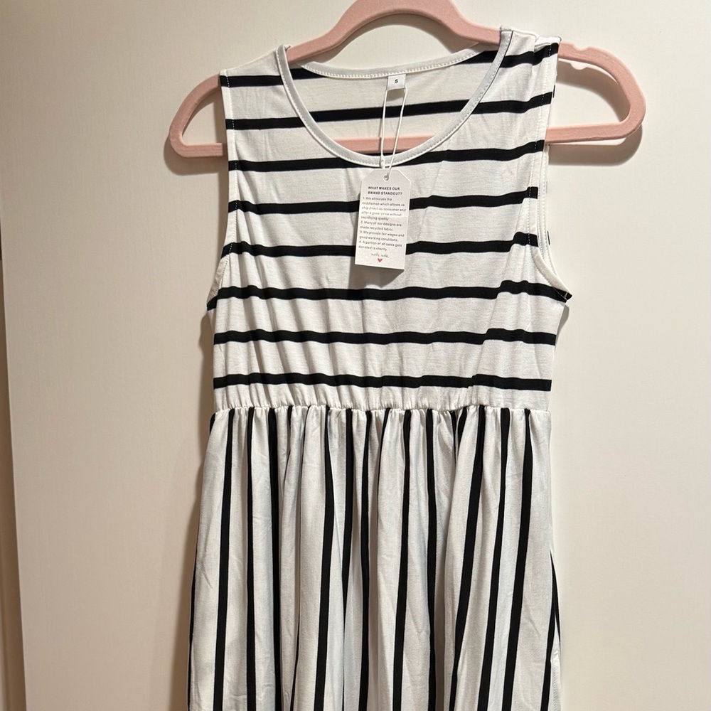 Woman’s stripped dress in small